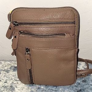 Brown cowhide leather crossbody purse.